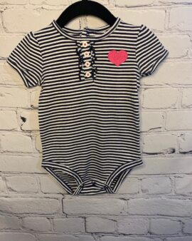 Carter’s Short Sleeved Onesie, 12Mo, White & navy striped detail pattern, pink glitter heart over left chest, button, ruffle detail on front, back snap enclosure