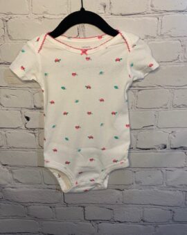 Carter’s Short Sleeved Onside, 12Mo, White w/ turtle detail pattern w/ pink lace trim around neck and bow on front