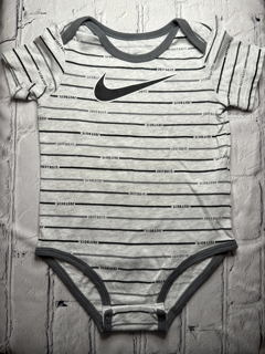 Nike, 18 Mo, t-shirt onsie, gray w. stripe ‘just do it’ pattern, nike swoosh on front